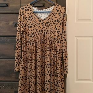 Long sleeve tan leopard dress never worn.